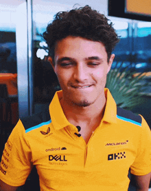 Man With Curly Hair In Yellow Dell Polo GIF