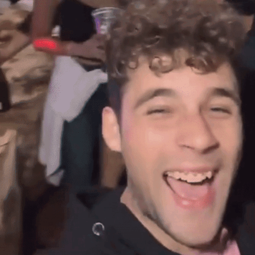 Man with Curly Hair Laughing
