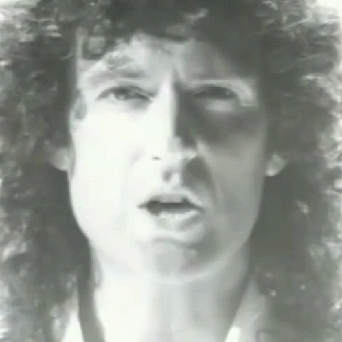 Man with Curly Hair Making a Face