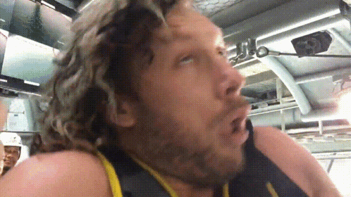 Man with Curly Hair Making Funny Face