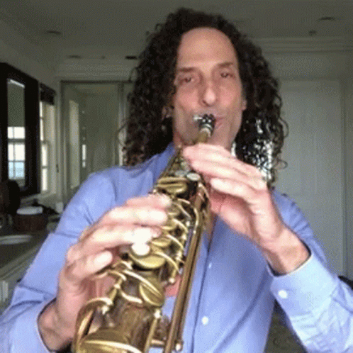 Man with Curly Hair Playing Saxophone