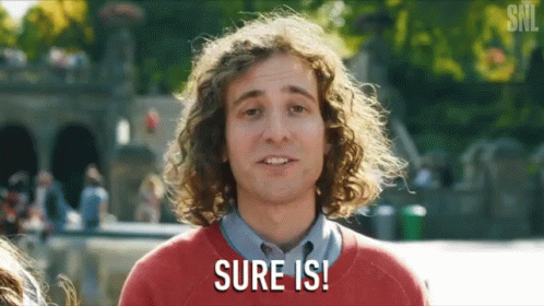 Man With Curly Hair Saying Sure GIF