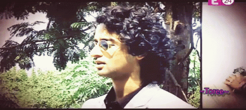 Man With Curly Hair Saying Toree