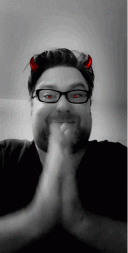 Man with Devil Horns Smiling