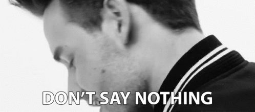 Man with Do Not Say Nothing Text