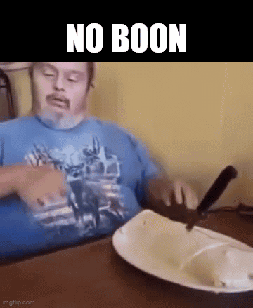 Man With Down Syndrome Sitting at Table With Plate and Knife