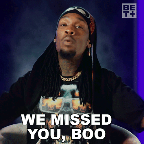 Man With Dreadlocks and Bandana Says We Missed You Boo