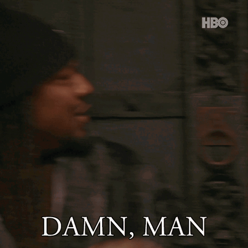 Man With Dreadlocks and Beanie Says Damn Man