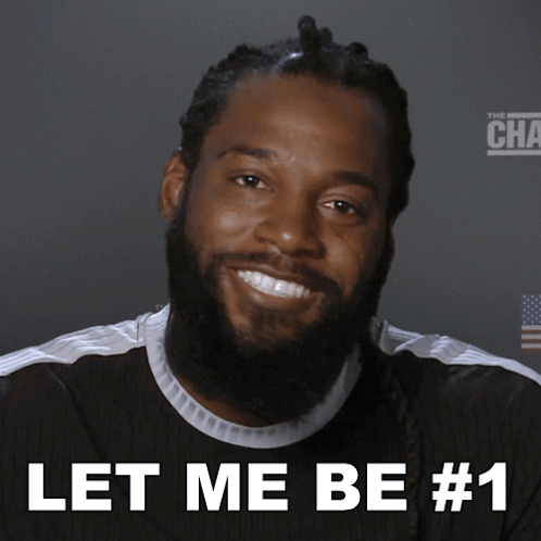 Man with Dreadlocks and Beard Saying Let Me Be