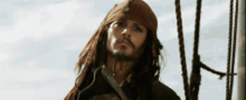 Man with Dreadlocks and Beard Wearing Bandana
