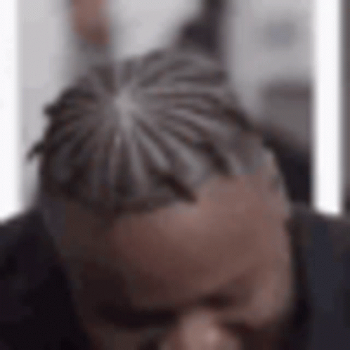 Man With Dreadlocks and Glasses