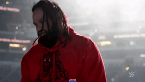 Man with Dreadlocks and JBPD Hoodie