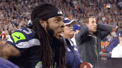 Man with Dreadlocks and Nike Headband