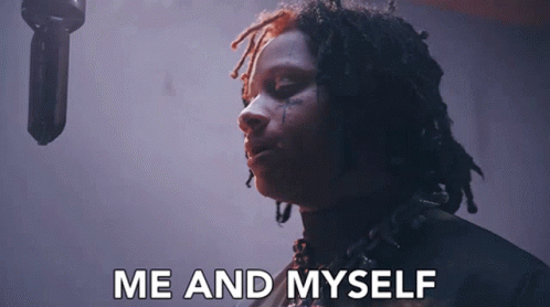 Man With Dreadlocks at Microphone Saying Me and Myself