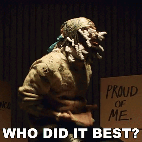 Man With Dreadlocks by Sign Saying Proud of Me Who Did It Best