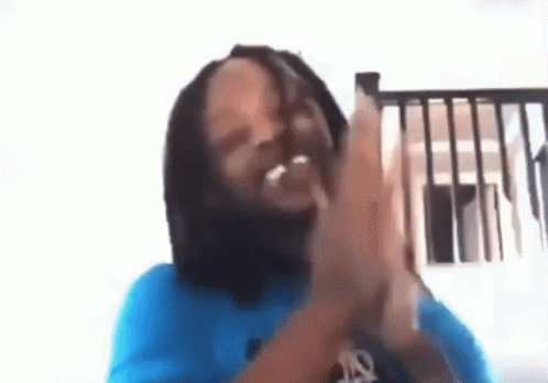 Man With Dreadlocks Clapping Hands