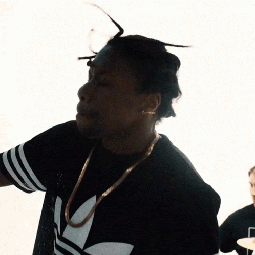 Man With Dreadlocks In Black Adidas Shirt GIF