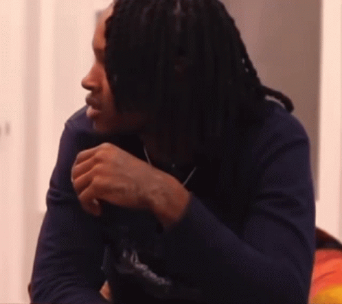 Man With Dreadlocks in Blue Supreme Shirt