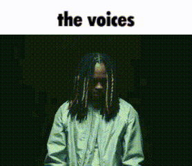 Man with Dreadlocks in Dark Room The Voices