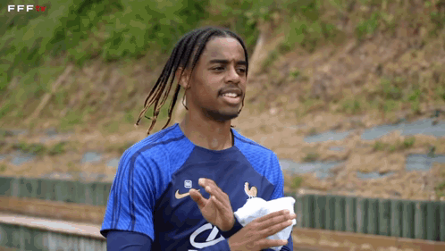 Man With Dreadlocks In FFF Shirt GIF