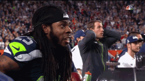 Man With Dreadlocks in Jersey Number 52