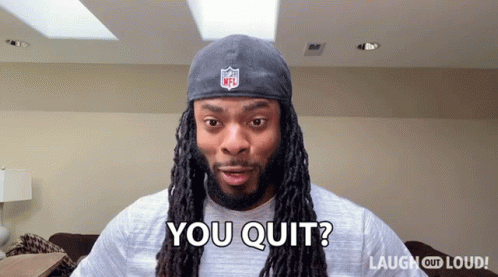 Man With Dreadlocks in NFL Hat Says You Quit