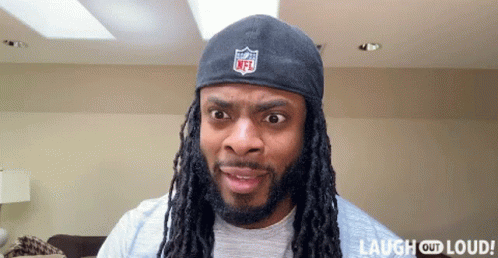 Man With Dreadlocks in NFL Headband