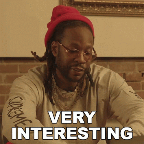 Man With Dreadlocks in Red Beanie Says Very Interesting