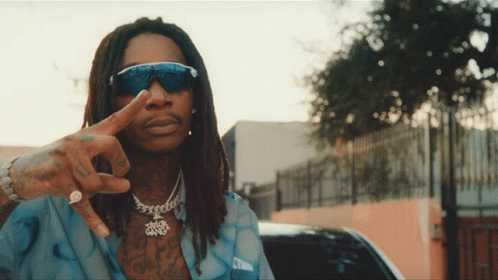 Man With Dreadlocks in Sunglasses Wearing CTNL Shirt