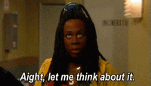 Man With Dreadlocks in Yellow Shirt Saying Aight Let Me Think About It