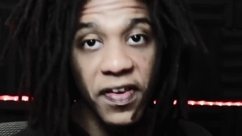 Man With Dreadlocks Making Funny Face