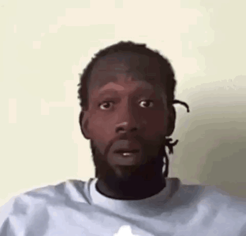 Man With Dreadlocks Making Funny Face GIF