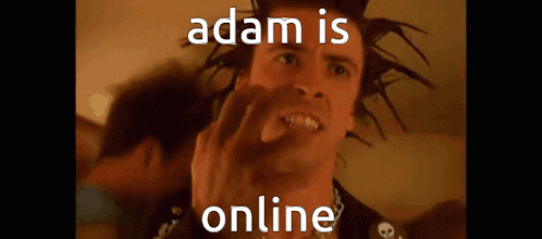 Man With Dreadlocks Making Funny Face With Adam Is Online Text