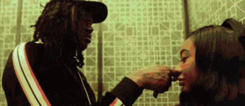 Man with Dreadlocks Saying Shhh