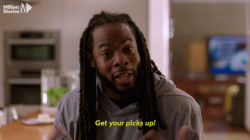 Man With Dreadlocks Says Get Your Picks Up