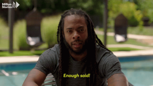 Man With Dreadlocks Sitting by Pool Says Enough Said