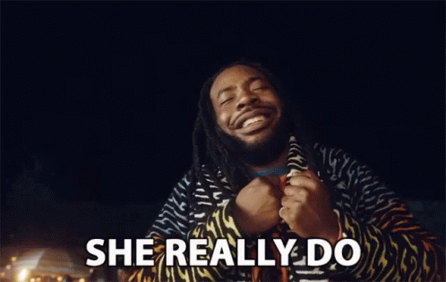 Man With Dreadlocks Smiling And Saying She Really Do GIF