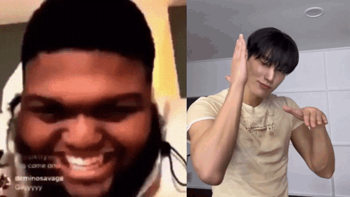 Man With Dreadlocks Smiling Next to Man in Tan Shirt