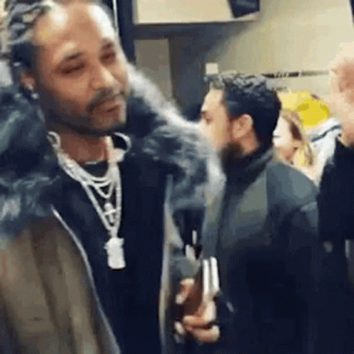 Man with Dreadlocks Smoking Cigarette