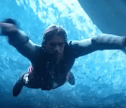 Man With Dreadlocks Swimming