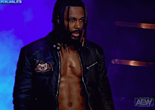 Man with Dreadlocks Wearing AEW Jacket