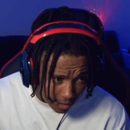 Man With Dreadlocks Wearing Headphones GIF