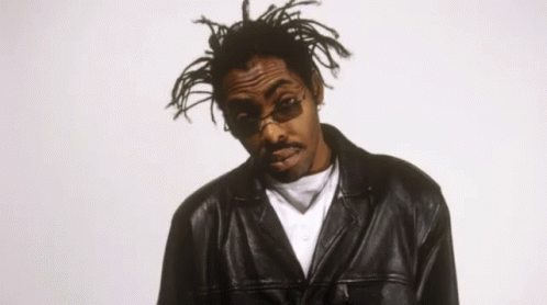 Man with Dreadlocks Wearing Sunglasses and Leather Jacket