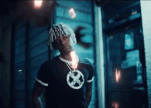 Man with Dreadlocks Wearing X-Men Shirt