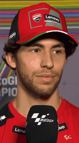 Man With Ducati Hat and Lenovo Shirt on Microphone