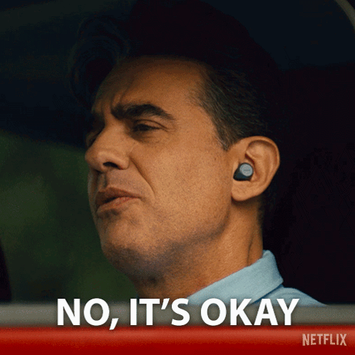 Man with Ear Buds Saying No It's Okay in Netflix Ad