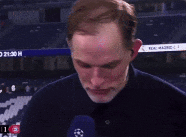 Man With Earbuds Talking Into Microphone Real Madrid Sign GIF