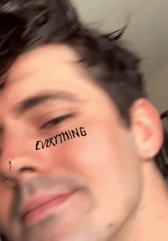 Man With Everything On Face GIF