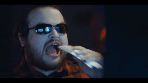 Man With Eyeglass Chewing GIF