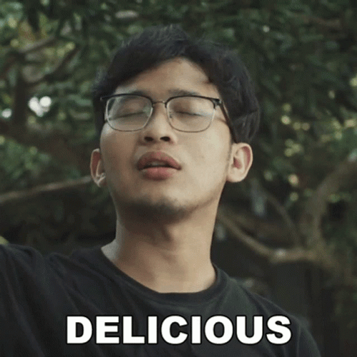 Man With Eyeglass Discussing Delicious Snack GIF